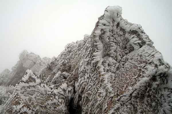 View of Ricm on the roks on the approach to Pyramid peak