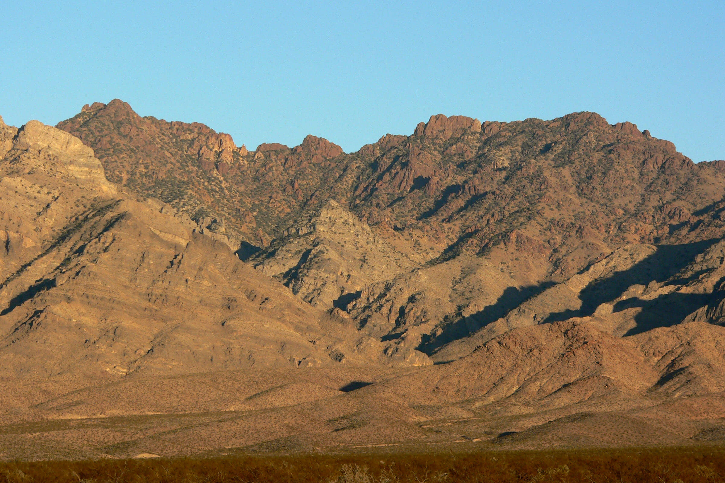 The Providence Mountains are found in the eastern Mojave Desert of San Bernardino County, California, U.S. The range reaches an elevation of 7,162 feet at Edgar Peak and is home to the Mitchell Caverns Natural Preserve.